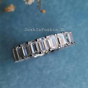 Diamond simulant eternity band in sterling silver